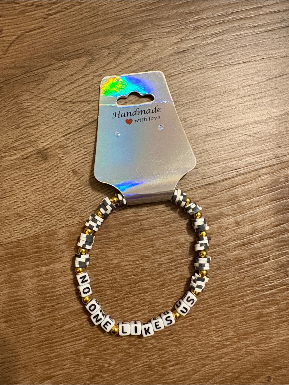 Handmade "No One Likes Us" Beaded Bracelet - Black & White with Gold Accents